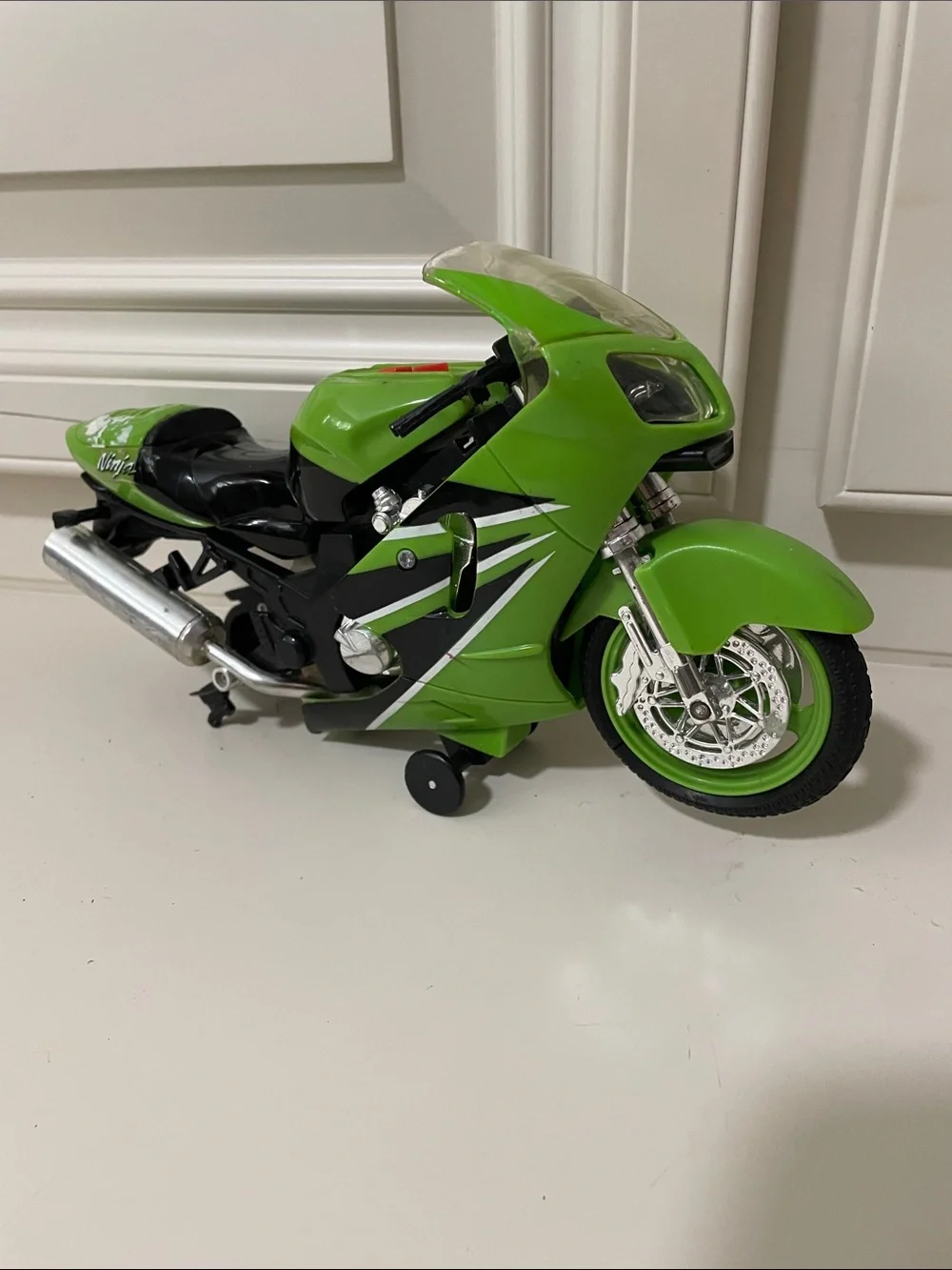 Green Ninja-Style Kids Motorcycle Toy - Realistic Ride-side broken